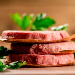Fresh raw burger on the table.