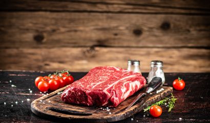 A fresh piece of raw beef on the table.